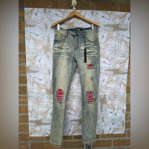 AMIRI  antique indigo bandana patch jeans size 32